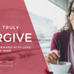 woman happily contemplating while stirring a cup of coffee